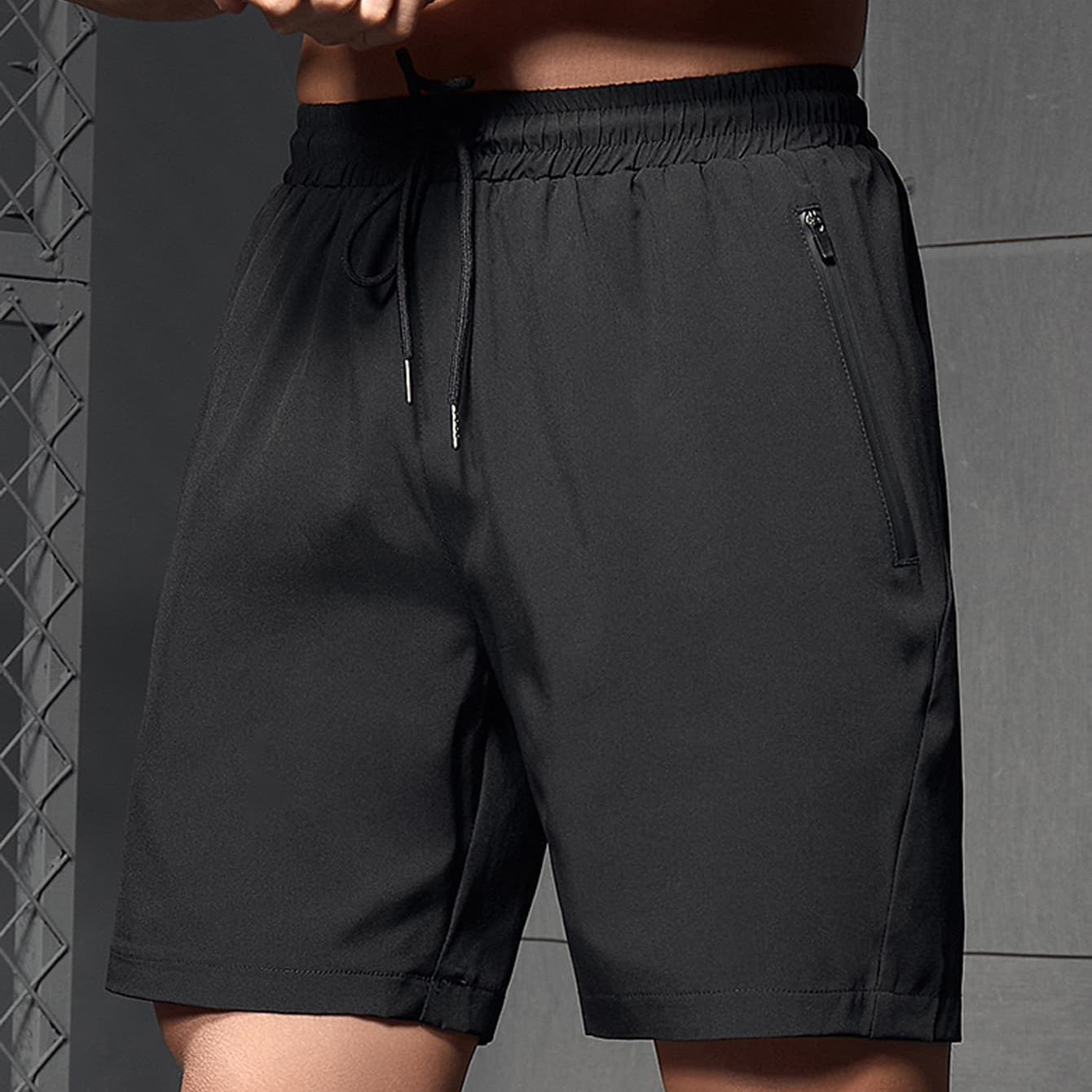 Popular men's sports shorts with letter patterns and zipper pockets, made of polyester and cotton, suitable for fitness and jogging, as well as for casual wear in summer. Customized with printed designs