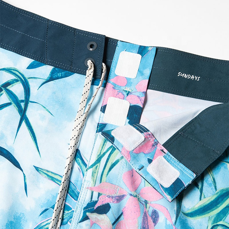 Customized high-quality quick-drying men's beach swim trunks in plus sizes, with printed designs and waterproof features