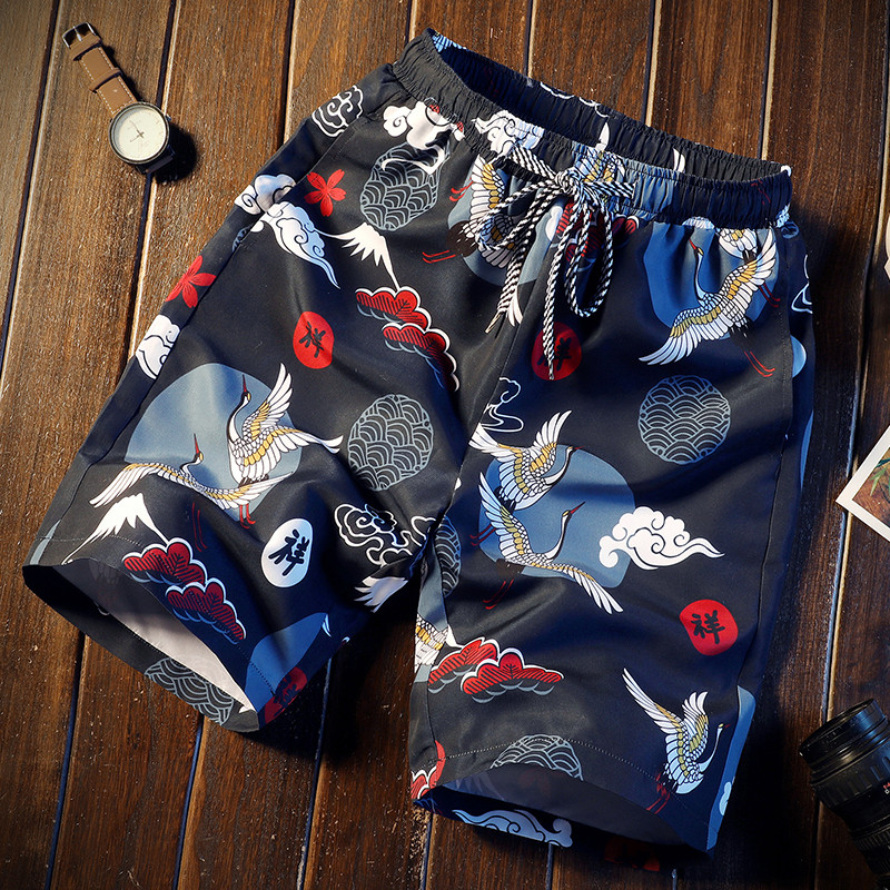 Customized men's shorts made of polyester with logo prints, which are hot-selling in summer and fashionable for holidays and leisure on the beach