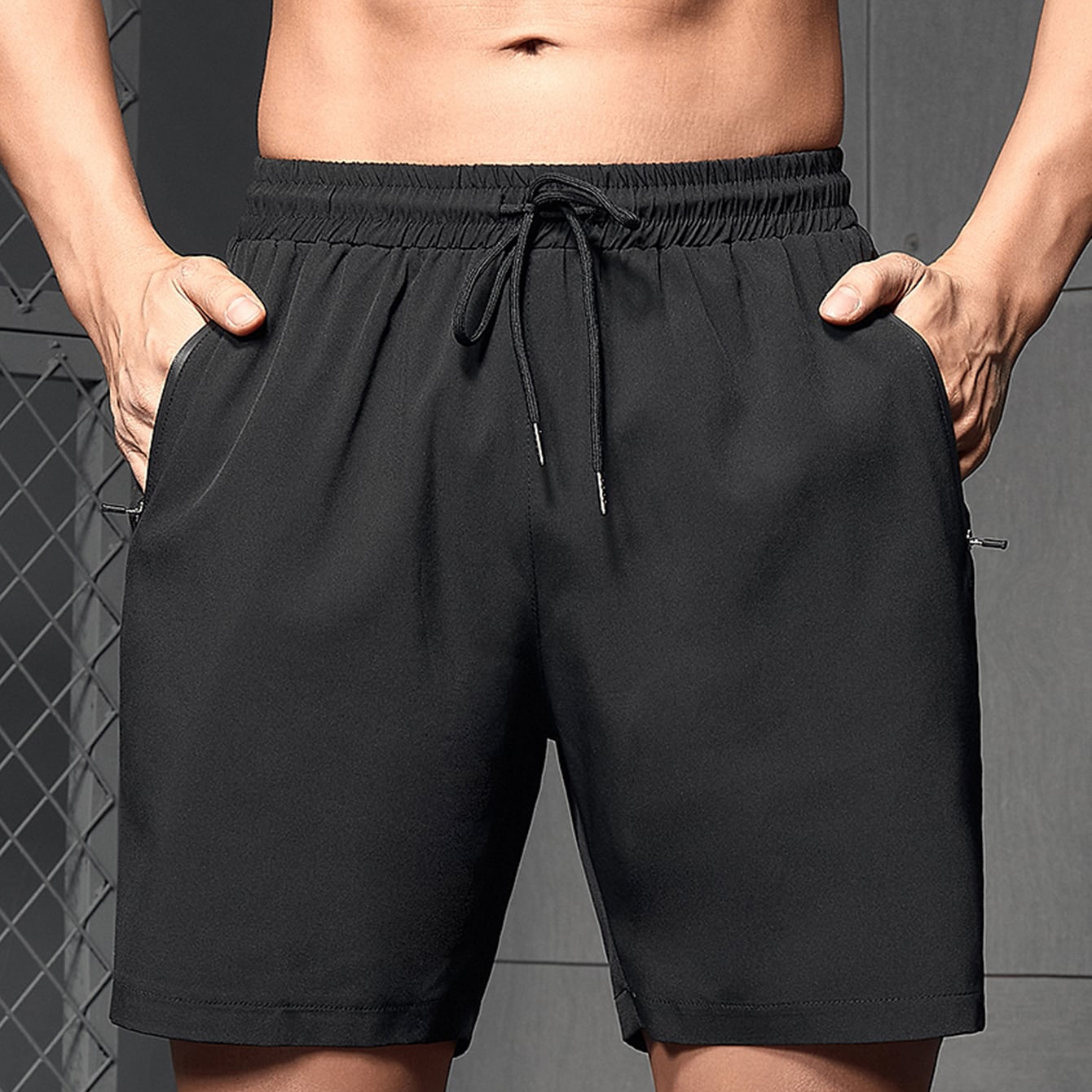 Popular men's sports shorts with letter patterns and zipper pockets, made of polyester and cotton, suitable for fitness and jogging, as well as for casual wear in summer. Customized with printed designs