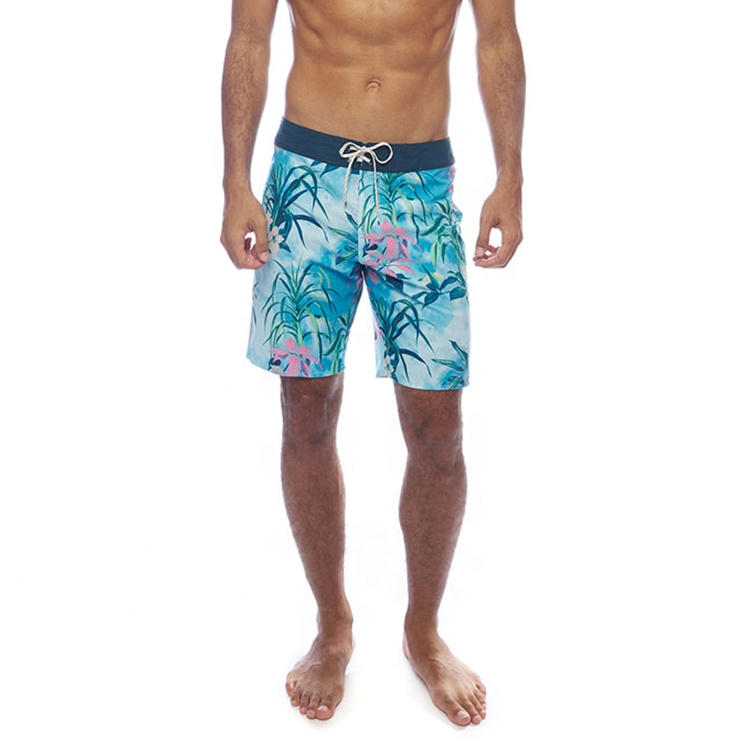 Customized high-quality quick-drying men's beach swim trunks in plus sizes, with printed designs and waterproof features